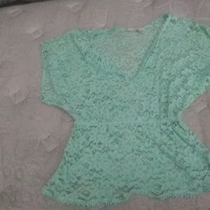 A mint green top